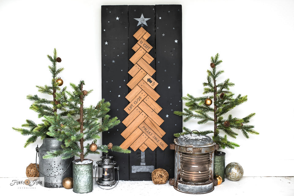 Learn how to make this charming Herringbone Wood Christmas Tree with wood planks! With Funky Junk's Old Sign Stencils.