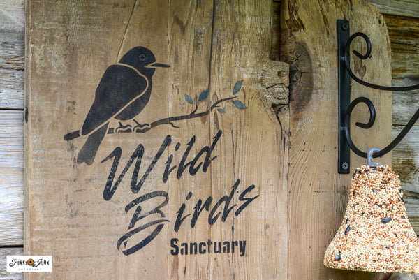 Bird feeding station with Wild Birds Sanctuary sign by Funky Junk's Old Sign Stencils